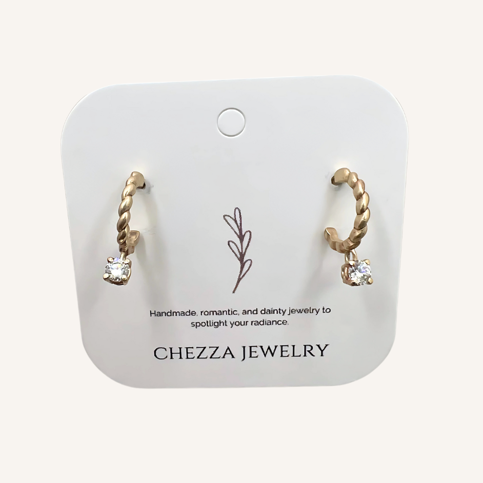 Gold hoop earrings with diamond drops 