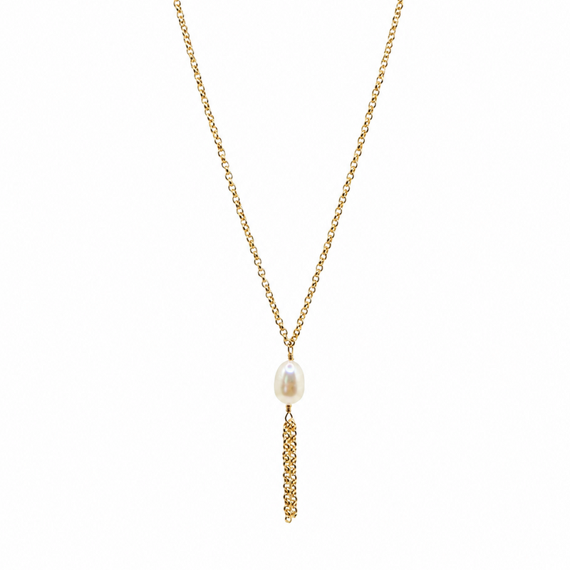 A thick gold chain necklace featuring a single white freshwater pearl pendant, with a vertical textured gold drop below it.