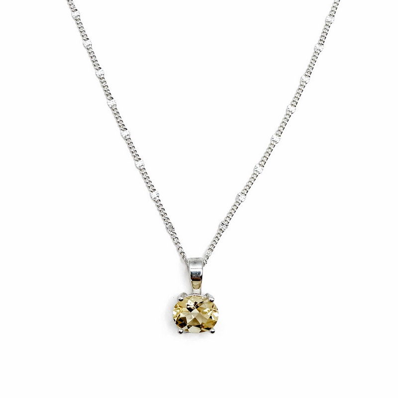 Silver necklace with an oval yellow citrine