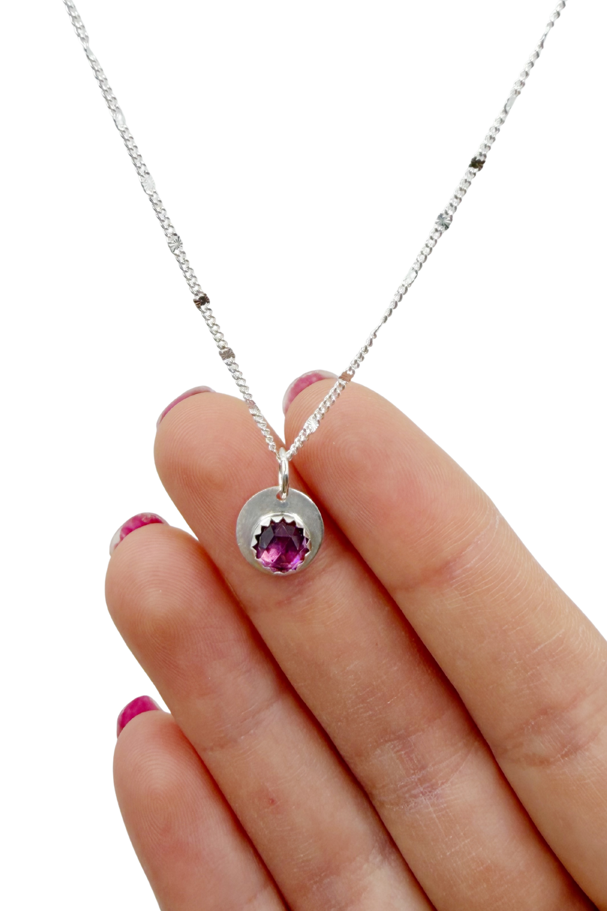 Silver necklace with a pink rhodolite garnet gemstone 