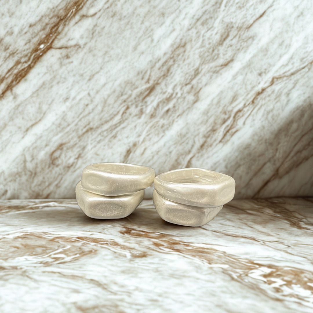Thick signet rings stacked