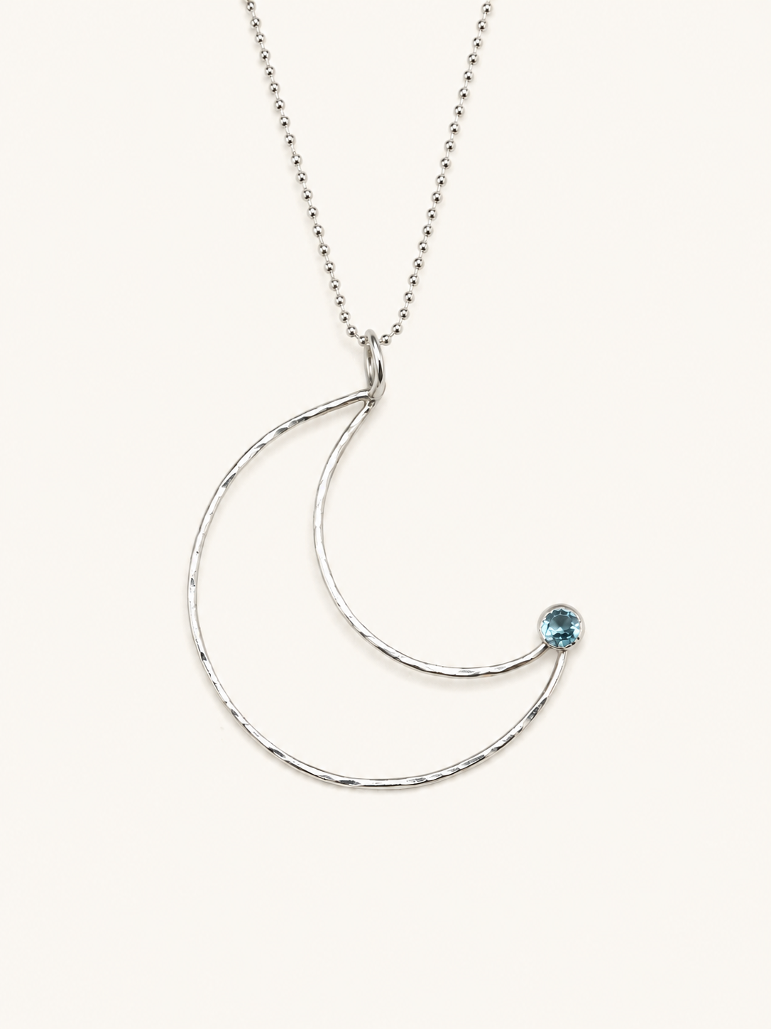 silver chain with large crescent moon pendant