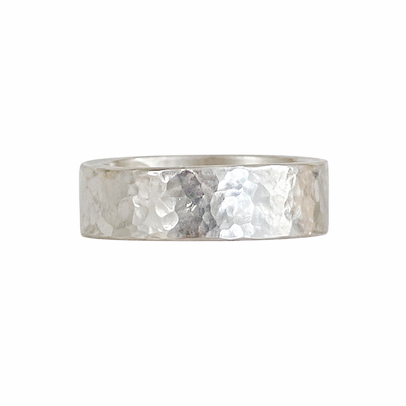 Silver ring with a textured surface 